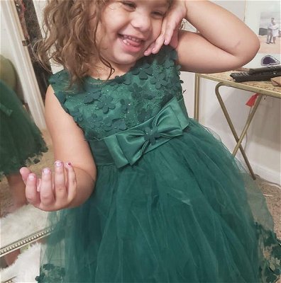cute babies with green dress