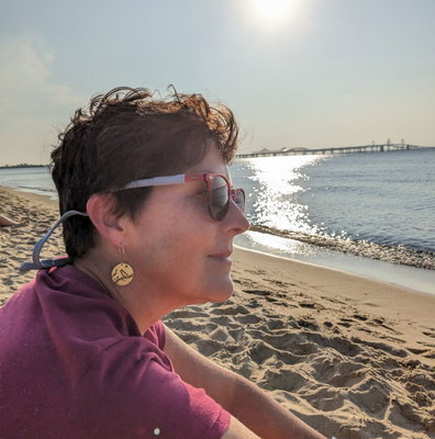 Customer wearing the Raven Earrings