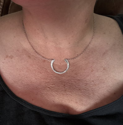 Customer wearing the Horseshoe Necklace